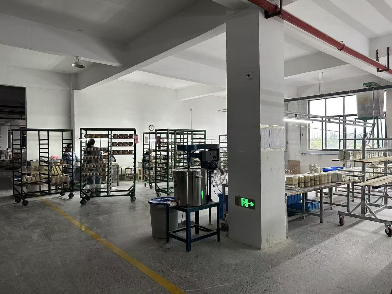 FUFORPETS factory workshop with product shelves and production tables
